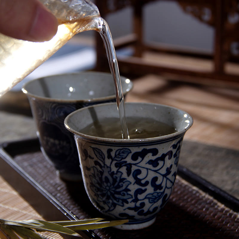 Buddha Stones Jingdezhen, porcelana azul y blanca, loto pintado a mano, flor de ciruelo, taza de té de cerámica, tazas de té de Kung Fu