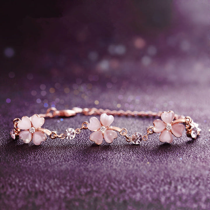 Pulsera de cadena de amor con trébol de cuatro hojas y cristal rosa con Buddha Stones