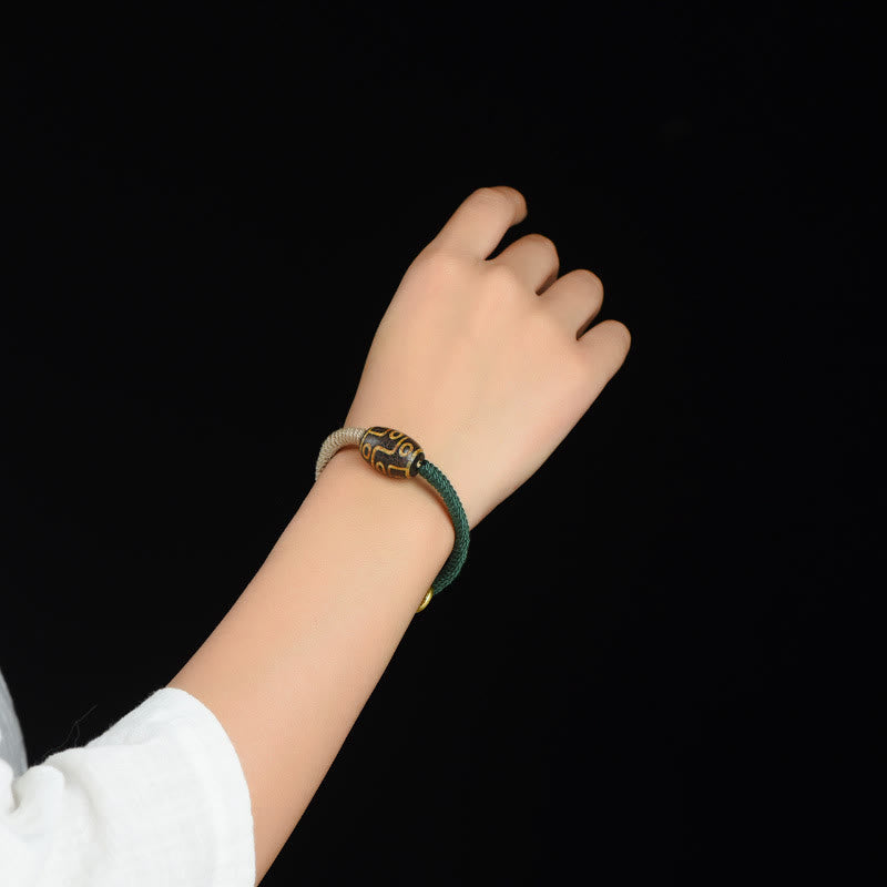 Pulsera de cuerda de riqueza con cuentas Dzi tibetanas de nueve ojos hechas a mano con Buddha Stones
