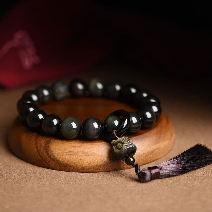 Buddha Stones negra Natural León muñeca Mala protección borlas bolsillo Mala decoración del coche