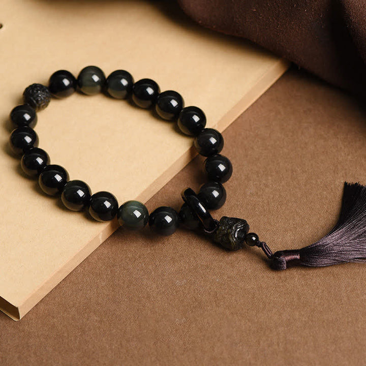 Buddha Stones negra Natural León muñeca Mala protección borlas bolsillo Mala decoración del coche