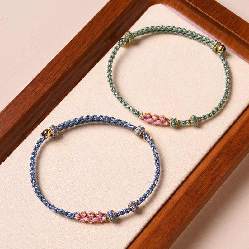 Pulsera de cuerda trenzada con protección de flor de melocotón hecha a mano con Buddha Stones