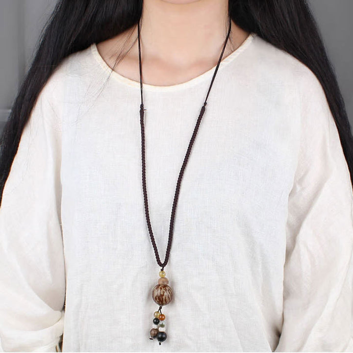 Collar con colgante de armonía de la sabiduría del loto de la semilla de Bodhi de las Buddha Stones - image 11