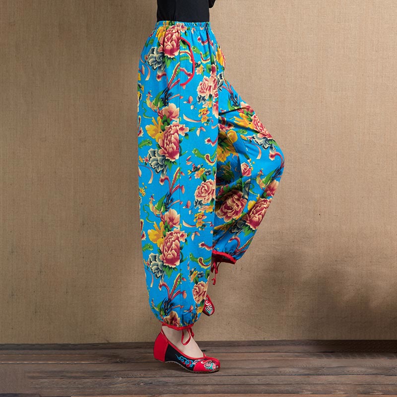 Pantalones bombachos con estampado de flores rojas y verdes de estilo étnico con Buddha Stones y bolsillos