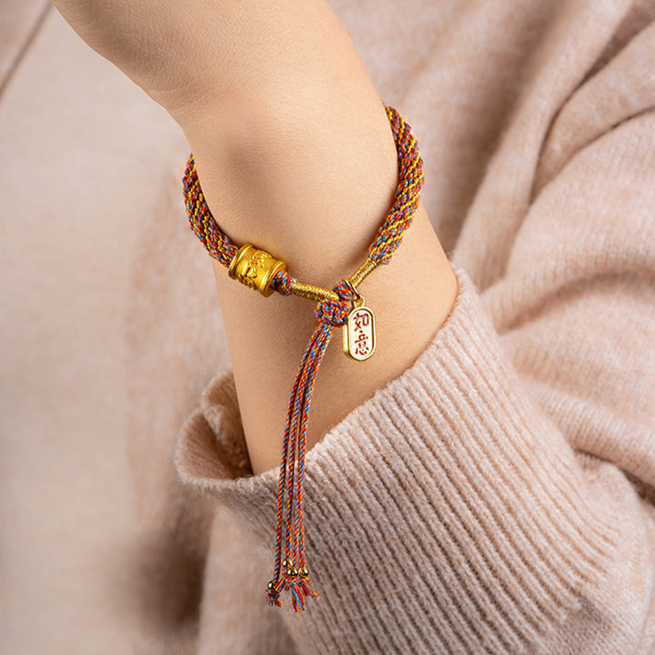 Pulsera trenzada con dije auspicioso de Om Mani Padme Hum tibetano multicolor hecho a mano con Buddha Stones
