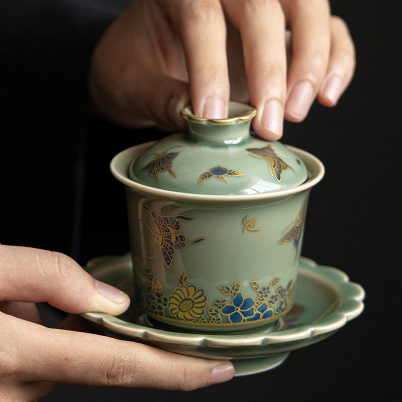 Buddha Stones de porcelana verde, mariposa, flor, salmón, pescado, cerámica, Gaiwan Sancai, taza de té de Kung Fu y platillo con tapa