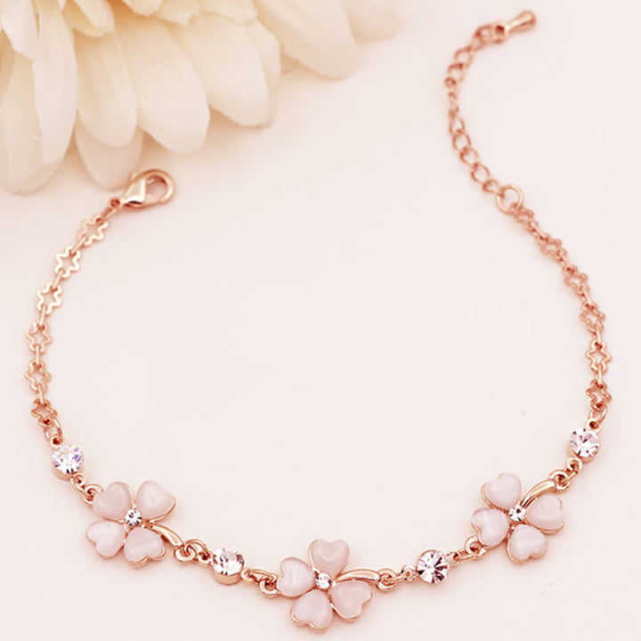 Pulsera de cadena de amor con trébol de cuatro hojas y cristal rosa con Buddha Stones