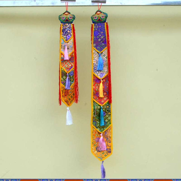 Flor de loto Ocho símbolos auspiciosos Meditación Iluminación Borlas coloridas Arte de pared
