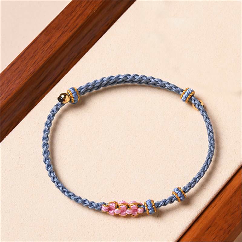 Pulsera de cuerda trenzada con protección de flor de melocotón hecha a mano con Buddha Stones