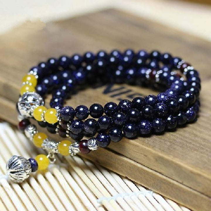 Pulsera con dijes de riqueza de piedra arenisca azul de piedras de Buddha Stones Mala