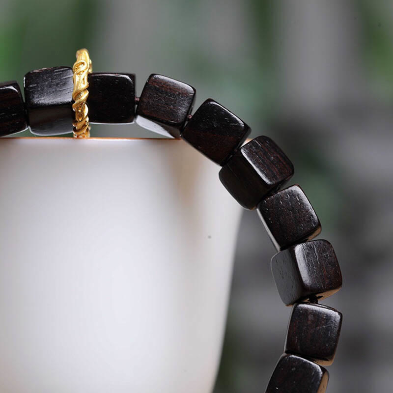 Pulsera de paz y calma con cuentas cuadradas de madera de ébano tibetano con Buddha Stones