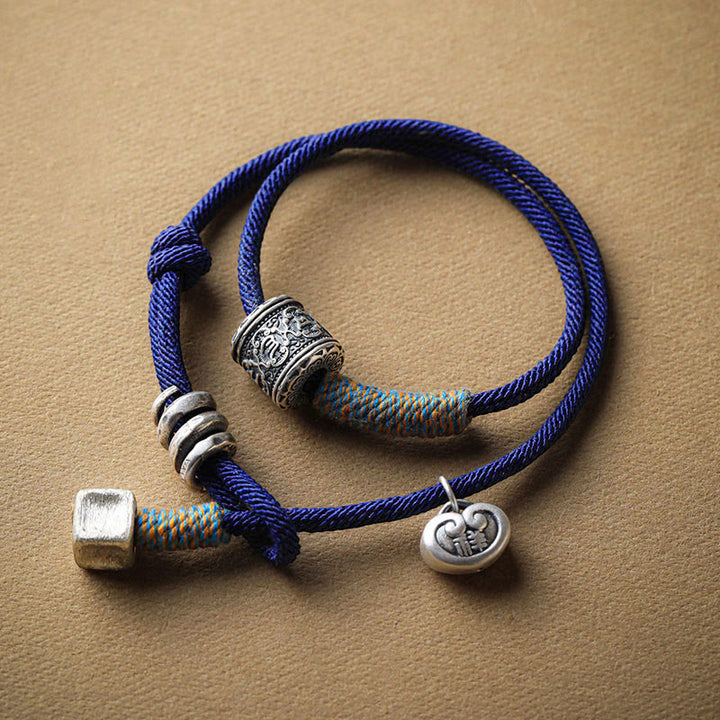 Pulsera de cuerda de doble envoltura con amuleto auspicioso tallado Om Mani Padme Hum tibetano hecho a mano con Buddha Stones