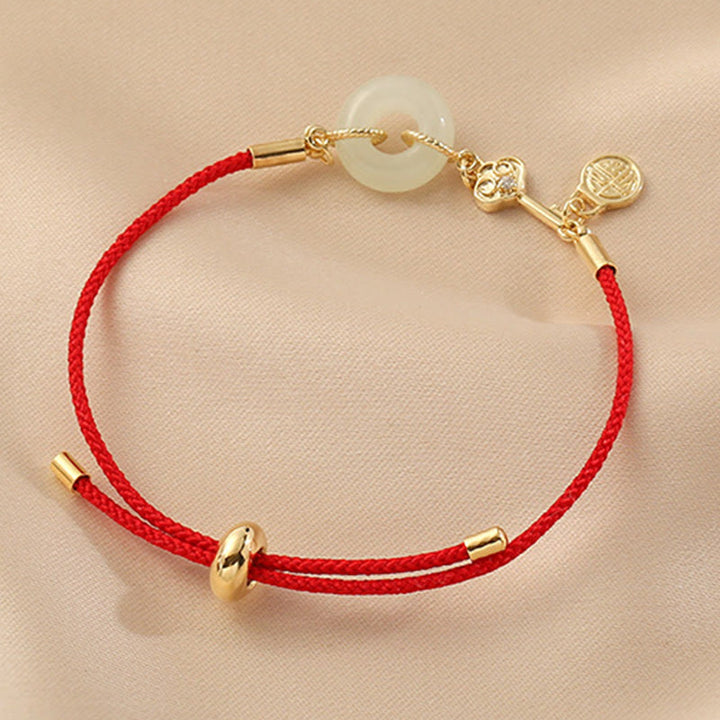 Pulsera de cuerda roja con hebilla de paz de jade hetiano chapado en oro de 18 quilates con Buddha Stones