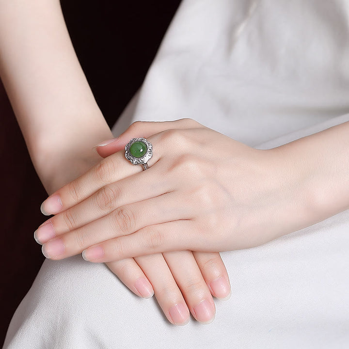 Anillo ajustable de la suerte con diseño de flor de jade cian hetiano de plata de ley 925 con Buddha Stones