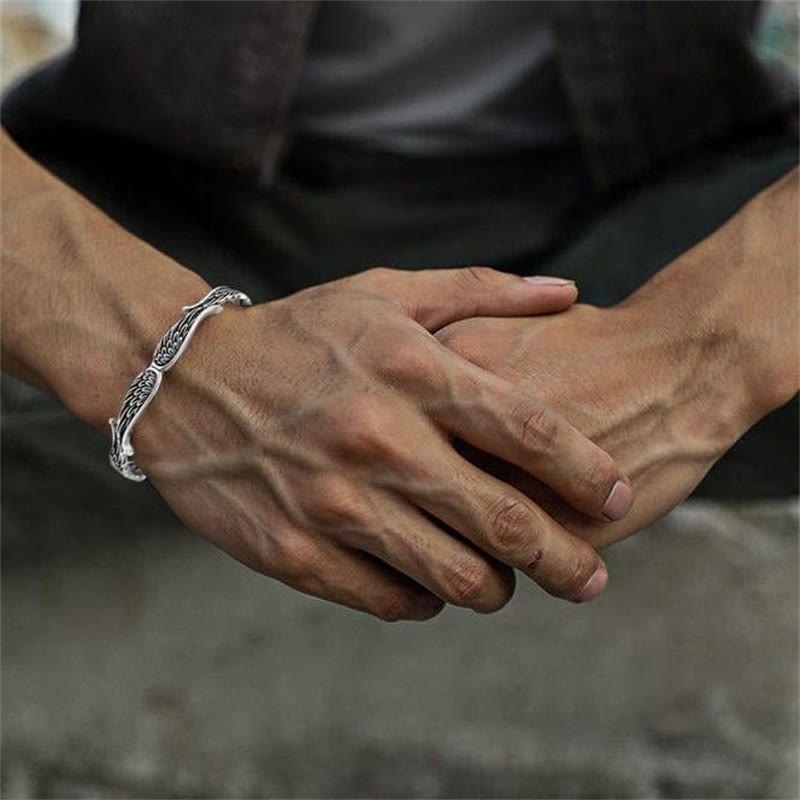 Brazalete de pulsera de la suerte tallada con patrón de plumas de alas de ángel de Buddha Stones