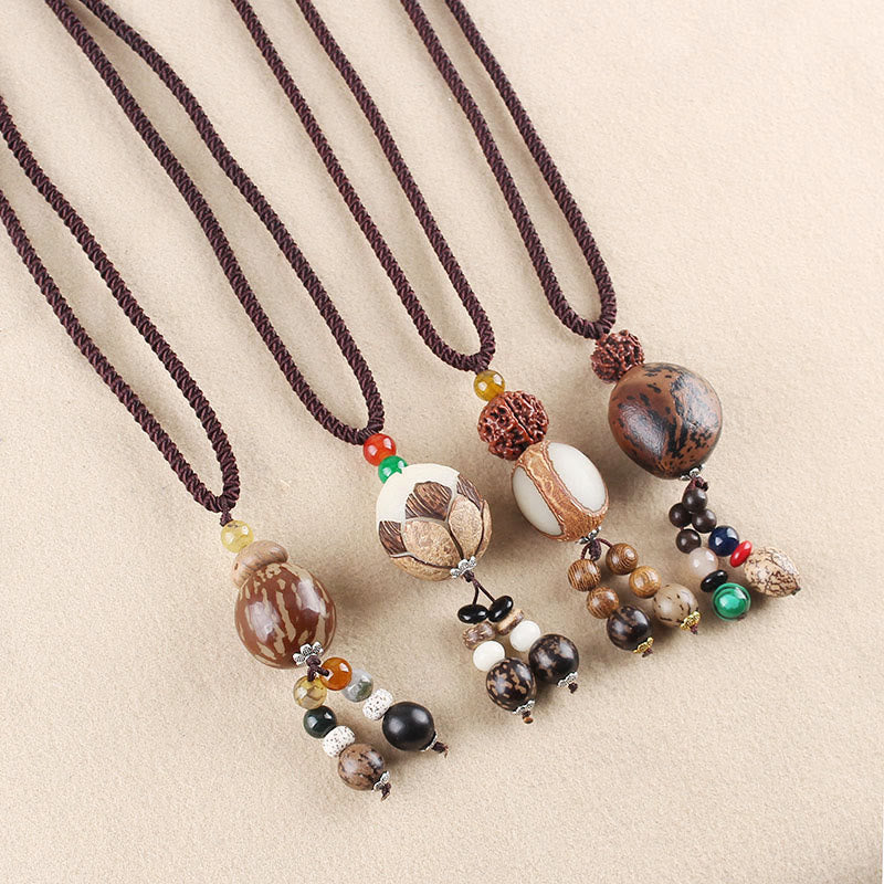 Collar con colgante de armonía de la sabiduría del loto de la semilla de Bodhi de las Buddha Stones - image 1