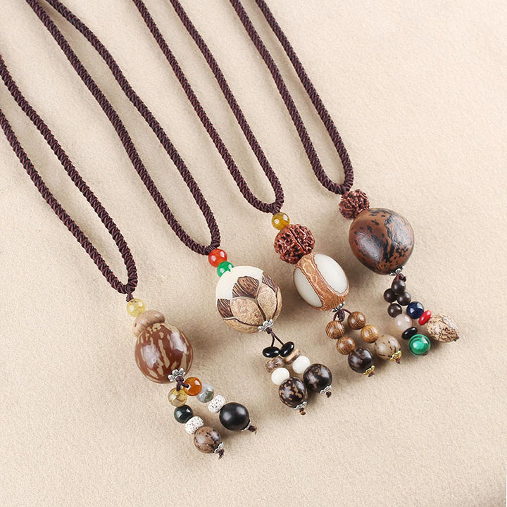 Collar con colgante de armonía de la sabiduría del loto de la semilla de Bodhi de las Buddha Stones - image 1