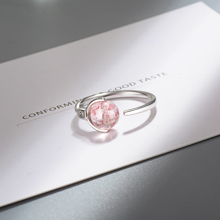 Anillo de rotación calmante de cristal rosa con Buddha Stones