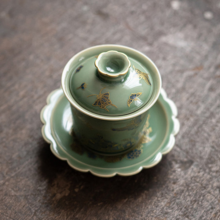 Buddha Stones de porcelana verde, mariposa, flor, salmón, pescado, cerámica, Gaiwan Sancai, taza de té de Kung Fu y platillo con tapa