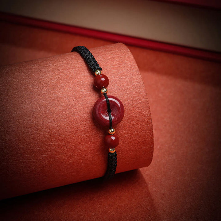 Pulsera de cuerda de bendición con hebilla de paz de cinabrio natural con Buddha Stones