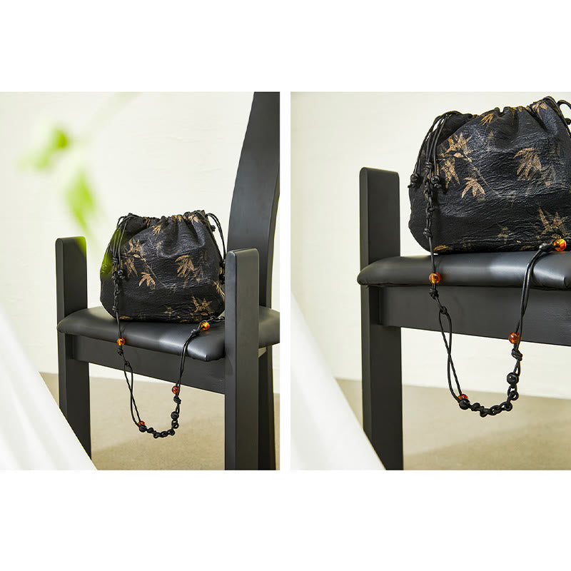Bolso bandolera de acetato con estampado de hojas de bambú amarillo con Buddha Stones