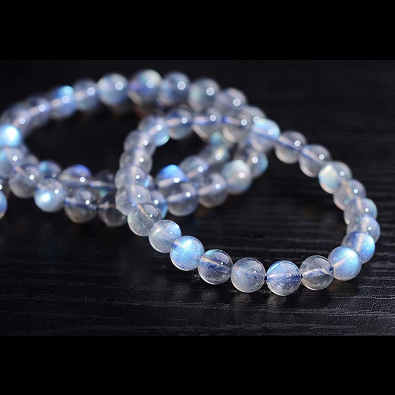 Pulsera de cuentas curativas de piedra lunar natural de piedras de Buddha Stones - image 9
