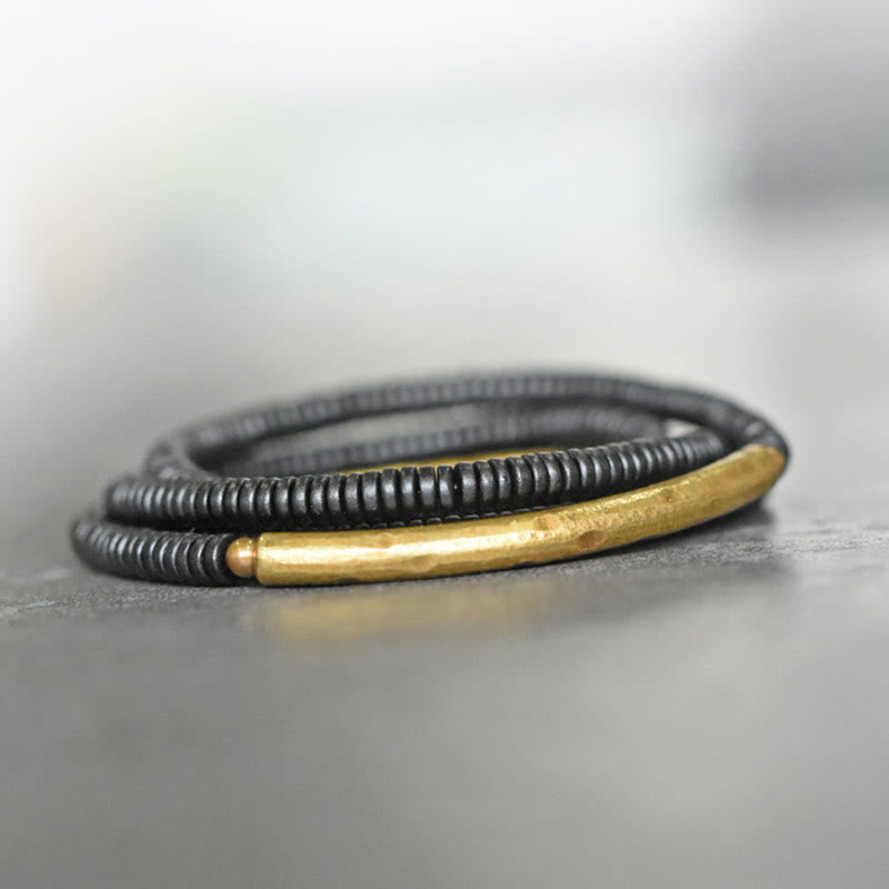 Pulsera multicapa con Buddha Stones, madera de ébano, latón y cobre - image 7