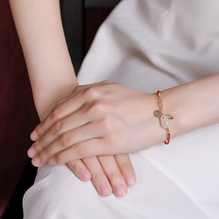 Pulsera de hilo rojo con bendición de la suerte de jade blanco hetiano del año del conejo de plata de ley 925