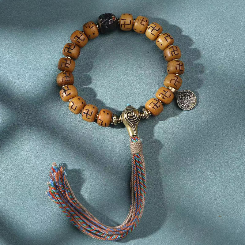 Buddha Stones, hueso de camello tibetano Natural, esvástica, cuentas Dzi, amuleto de Buda Shankha, Kirtimukha, pulsera con borla de protección de la suerte