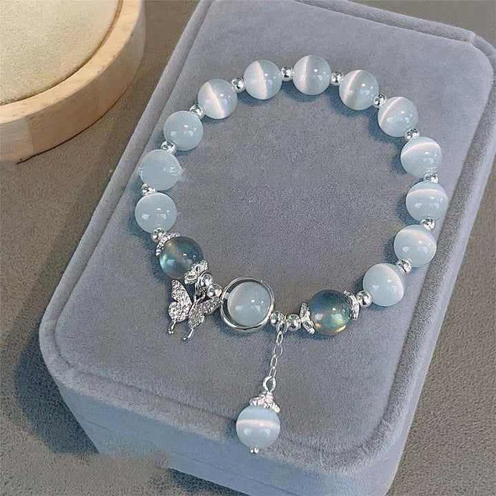 Pulsera de soporte con dije de estrella, mariposa, piedra lunar, ojo de gato, Buddha Stones