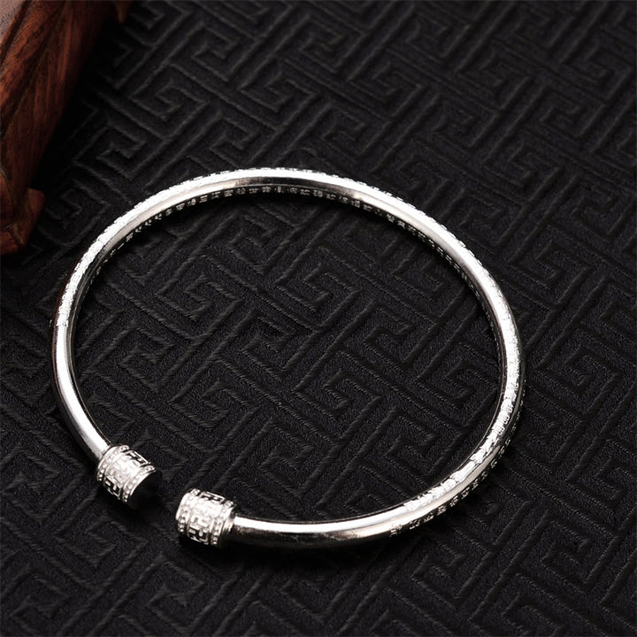 Brazalete de cobre blanco con diseño de esvástica grabado en Sutra del corazón