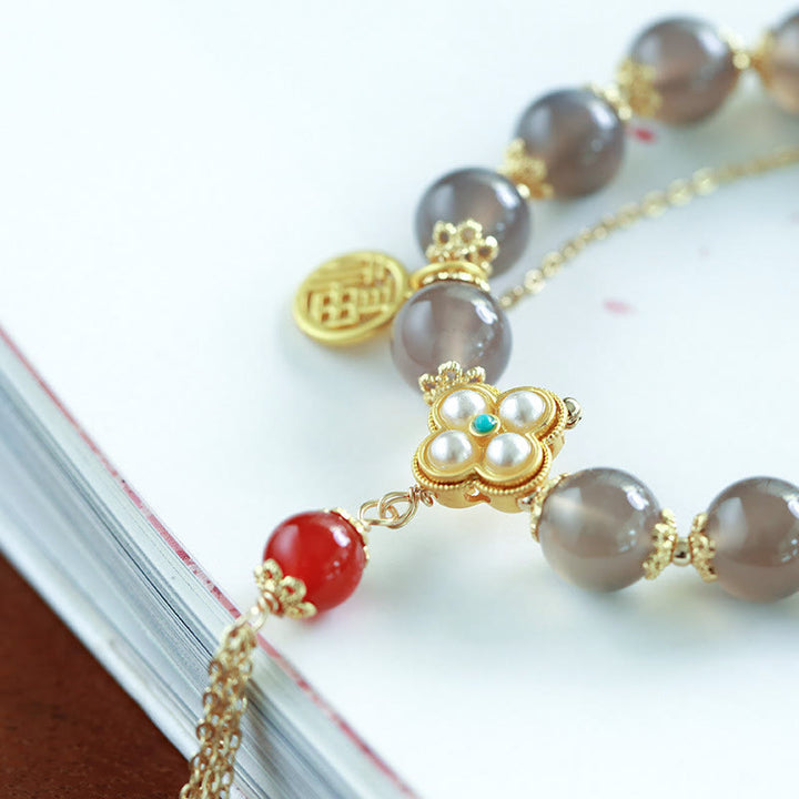 Pulsera de equilibrio con borlas y perlas de carácter Fu de ágata gris natural con Buddha Stones