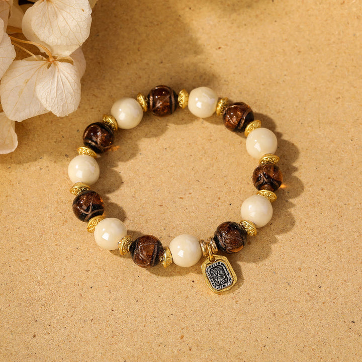 Buddha Stones tibetano Zakiram diosa de la riqueza encanto Liuli vidrio incienso ceniza porcelana pulsera de protección de cuentas