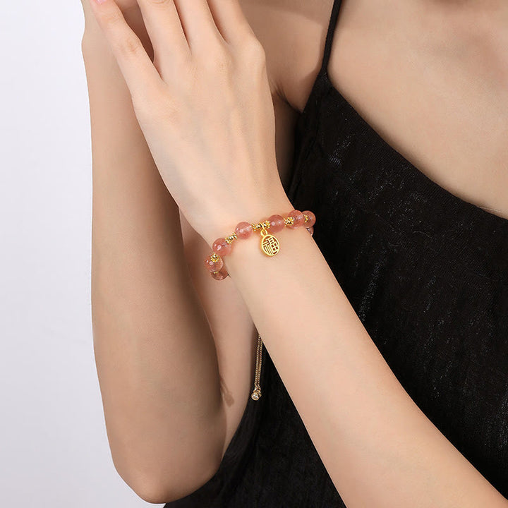 Pulsera con dije positivo de personaje Fu de cuarzo fresa natural chapado en oro de 14 quilates con Buddha Stones