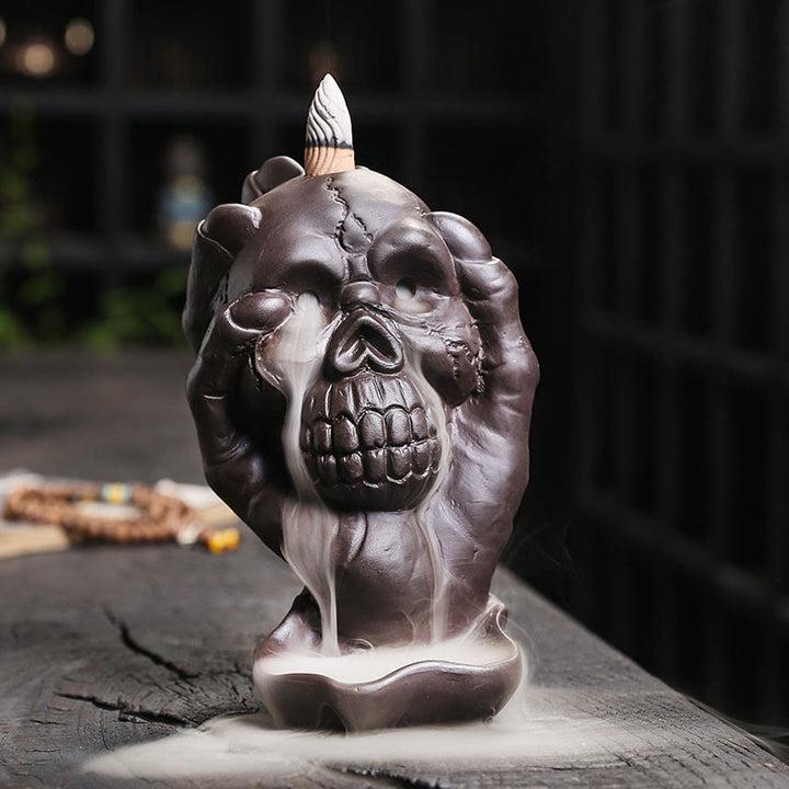Buddha Stones, calavera de Halloween con mano fantasma, decoración de quemador de incienso espiritual de arcilla púrpura