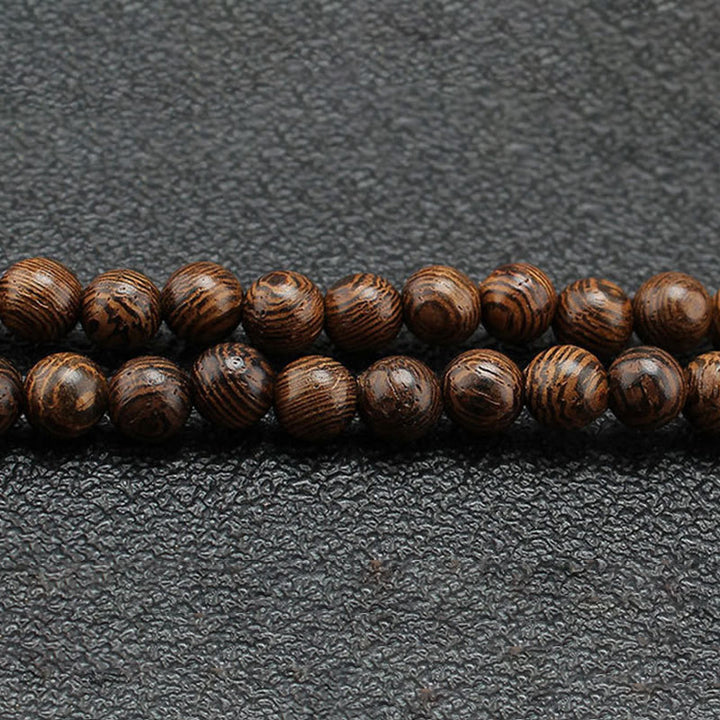 Buddha Stones Madera de wengué Piedra turquesa Protección Calma Collar Colgante