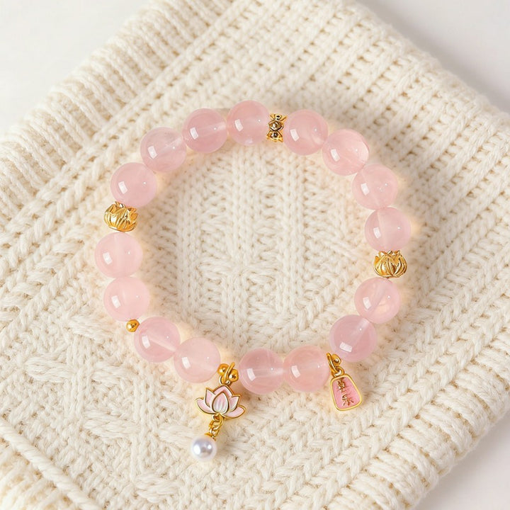 Buddha Stones Pulsera con dije de loto de cuarzo rosa natural y cuarzo transparente - image 1
