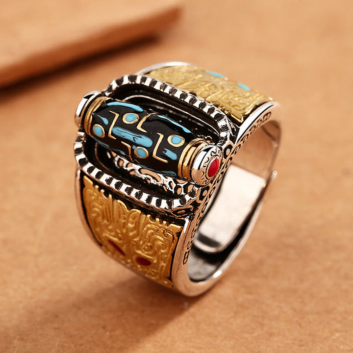 Anillo giratorio tibetano de nueve ojos con cuentas Dzi de Buddha Stones , bendiciones de riqueza