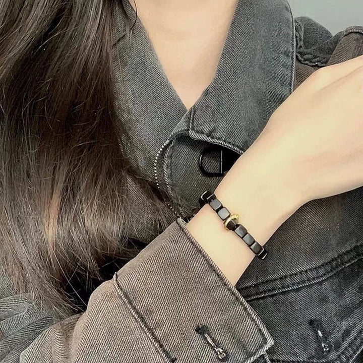 Pulsera de paz y calma con cuentas cuadradas de madera de ébano tibetano con Buddha Stones