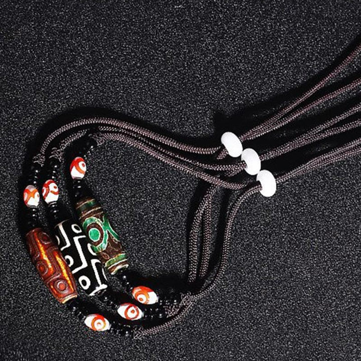 Collar de cadena de protección con cuentas Dzi tibetanas de nueve ojos con Buddha Stones