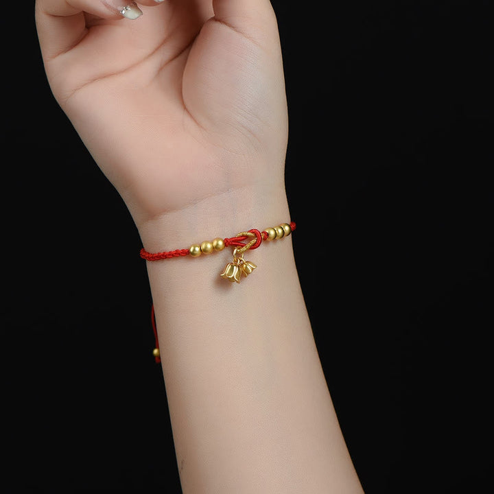 Pulsera trenzada de protección de la suerte con diseño de amuleto de flor de lirio de los valles hecha a mano con Buddha Stones