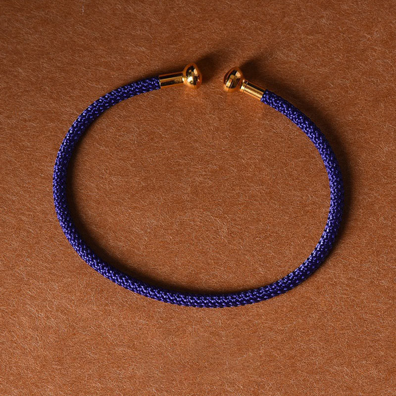 Pulsera de cuerda trenzada de la suerte hecha a mano con diseño simple de Buddha Stones