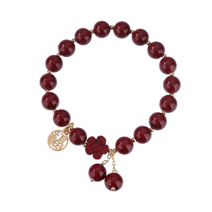 Pulsera de bendición de flor de cerezo con personaje de cinabrio de Buddha Stones