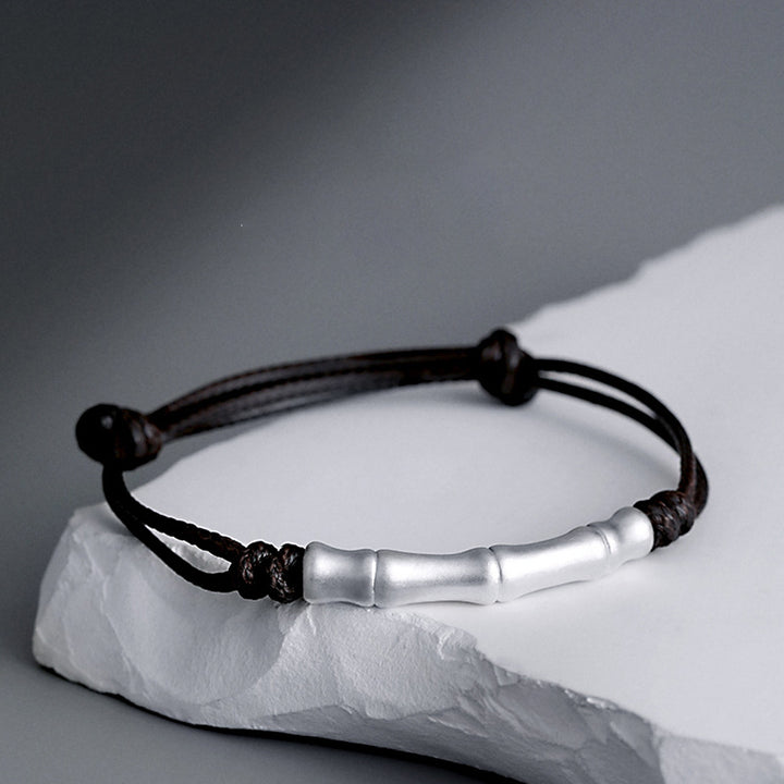Pulsera trenzada de cuerda de la suerte con patrón de hueso de plata de ley 999 con Buddha Stones