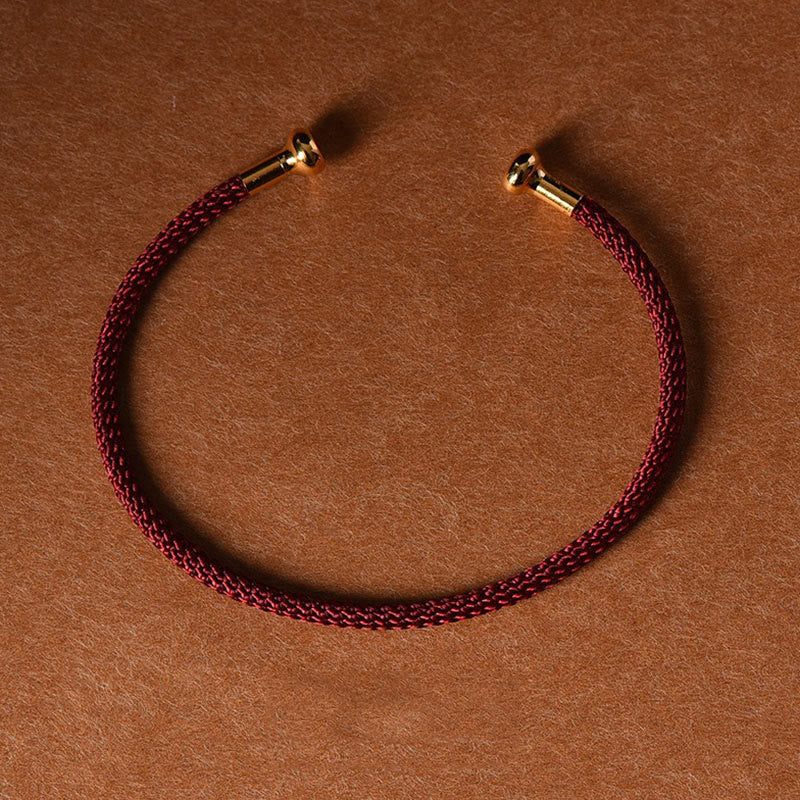 Pulsera de cuerda trenzada de la suerte hecha a mano con diseño simple de Buddha Stones