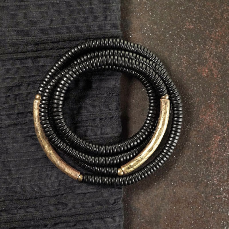 Pulsera multicapa con Buddha Stones, madera de ébano, latón y cobre - image 2