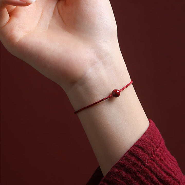 Pulsera de hilo rojo con bendición de ágata roja cinabrio natural con Buddha Stones