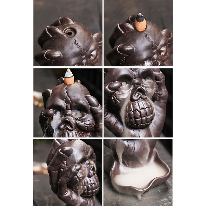 Buddha Stones, calavera de Halloween con mano fantasma, decoración de quemador de incienso espiritual de arcilla púrpura