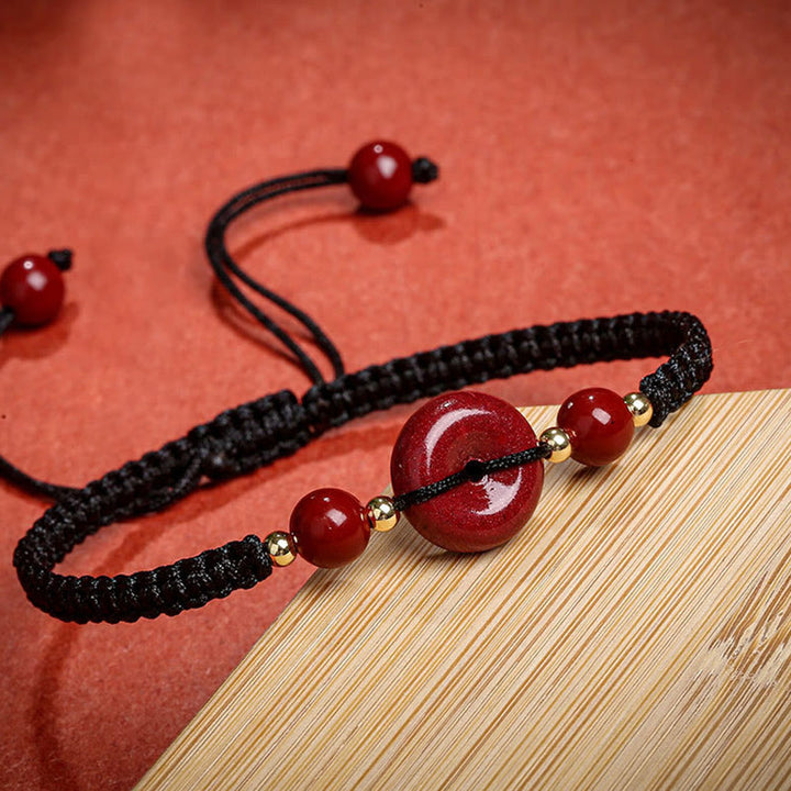 Pulsera de cuerda de bendición con hebilla de paz de cinabrio natural con Buddha Stones