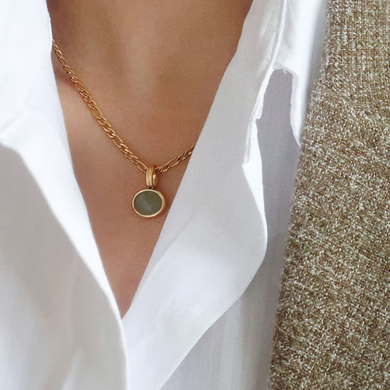 Colgante de collar de acero de titanio de fuerza turquesa ovalada